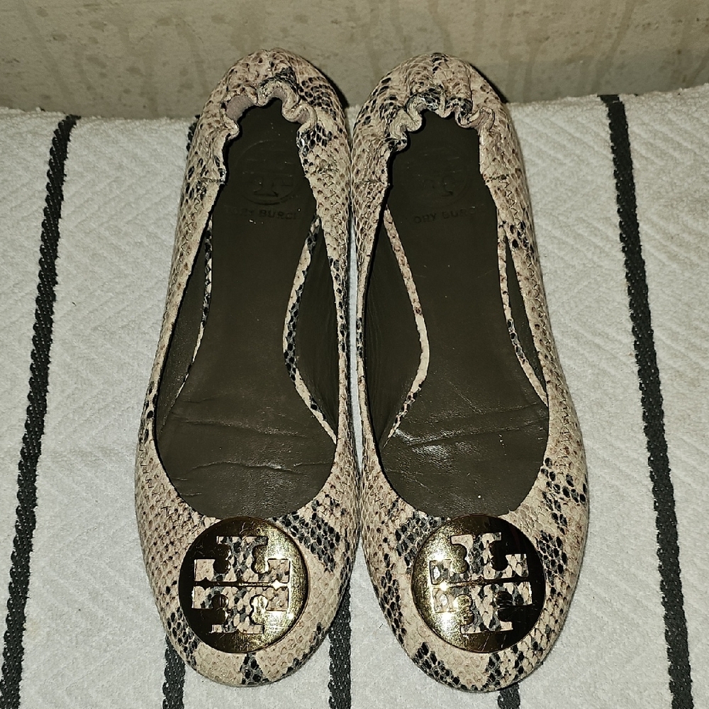 Tory Burch Black and Cream Flats with Gold Medallion